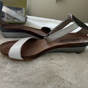 Gorgeous pair of NAOT Sandals.